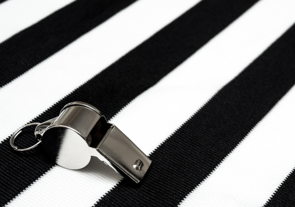 Black and white stripes and a whistle.